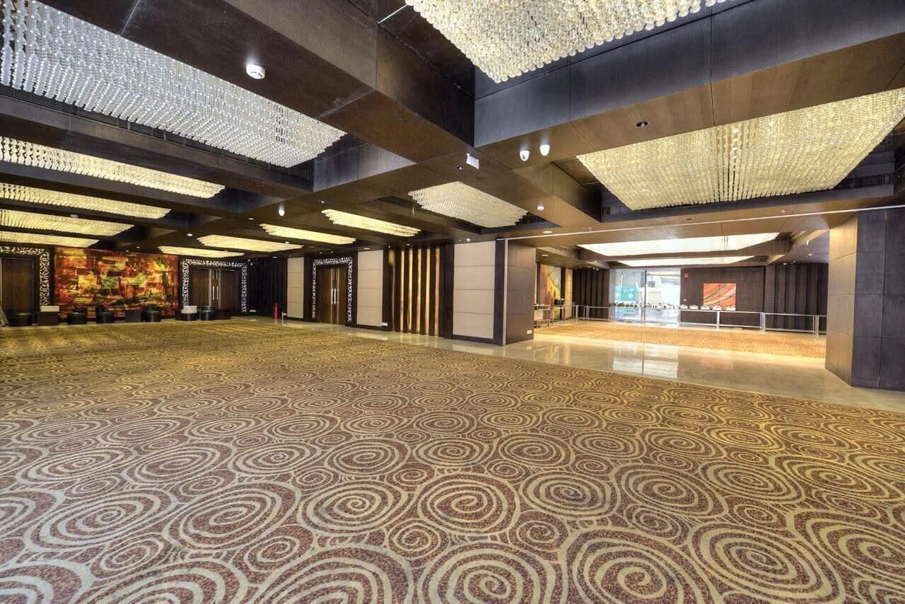 Crystal Palace hall with crystal ceiling panels and reception counter