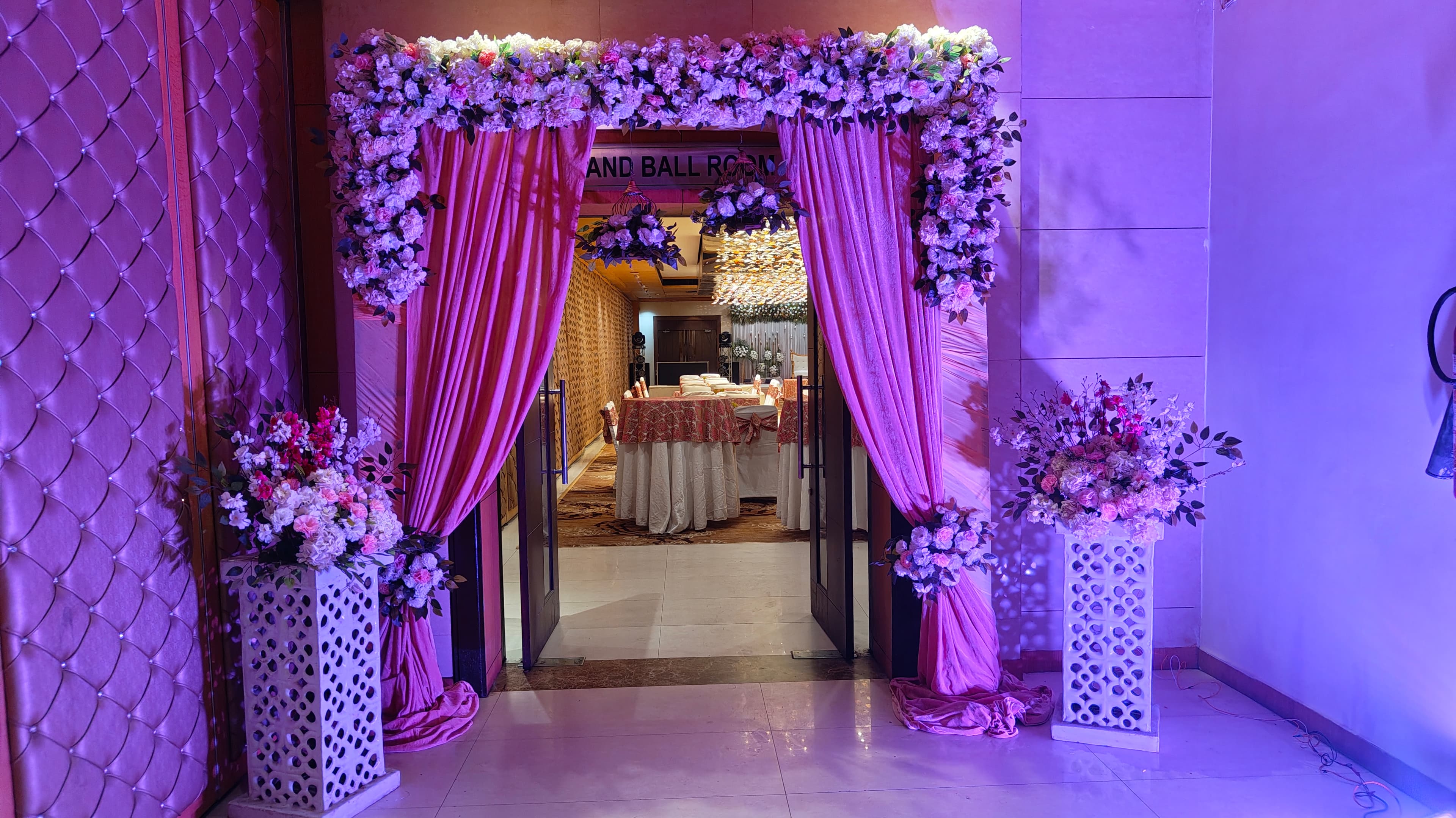 Draped and floral entrance to the Grand Ball Room