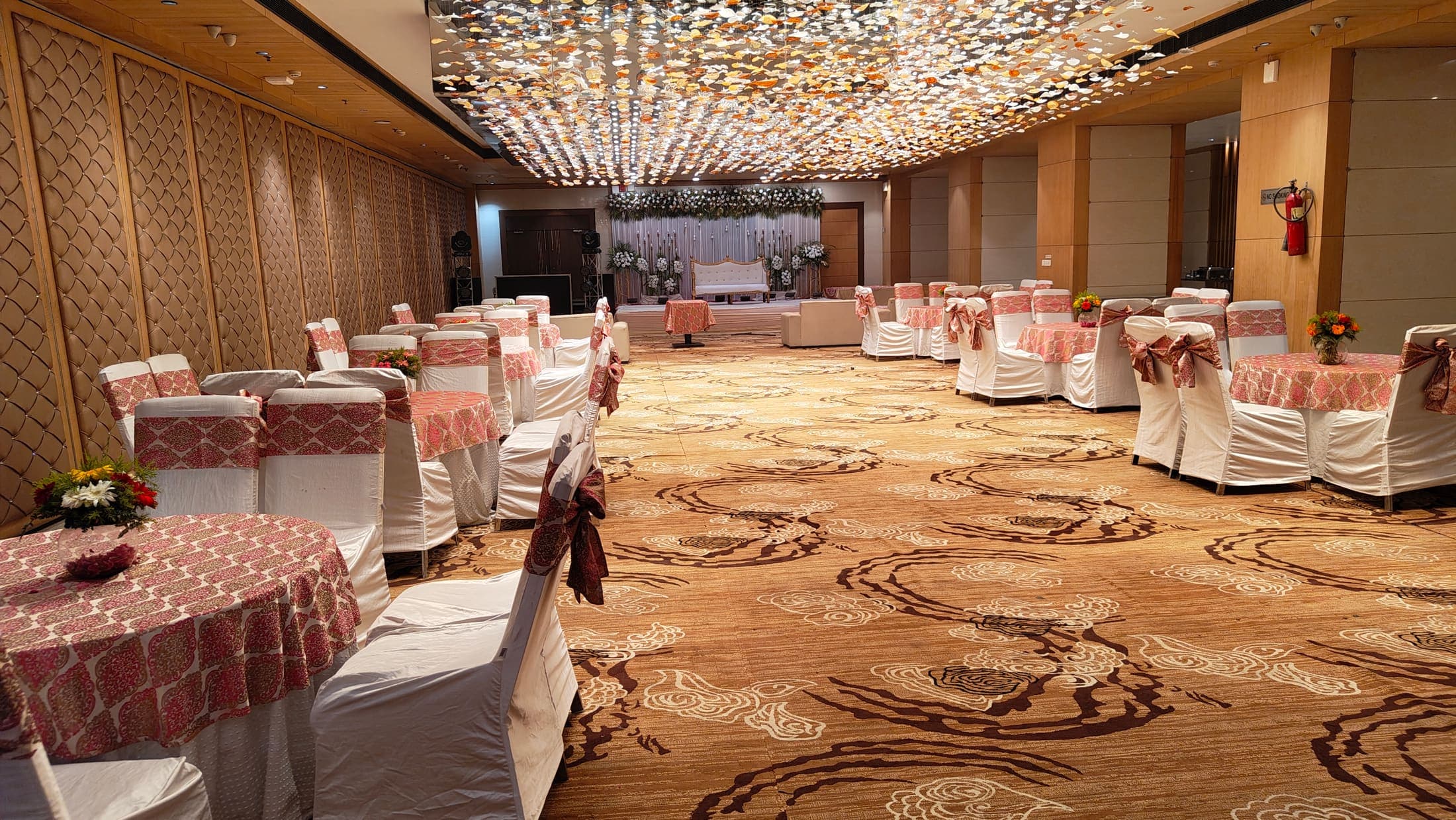 Wide view of a banquet celebration set up at Delite Grand, Faridabad